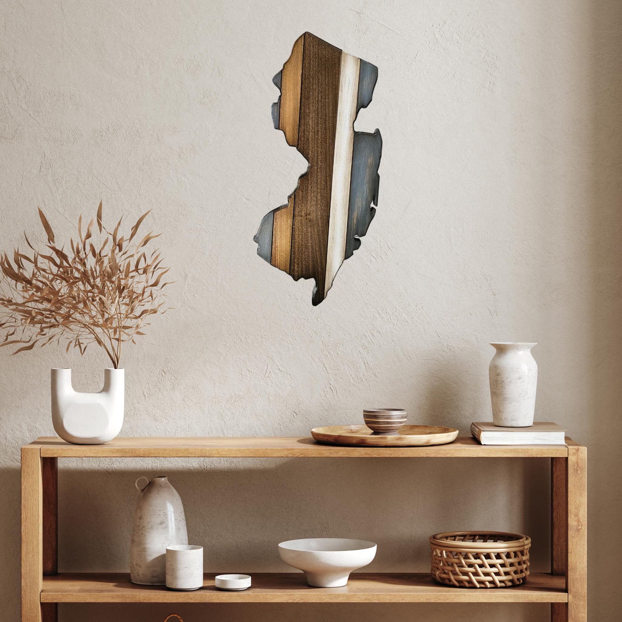 Rustic New Jersey wall art hanging on a neutral wall over an accent table