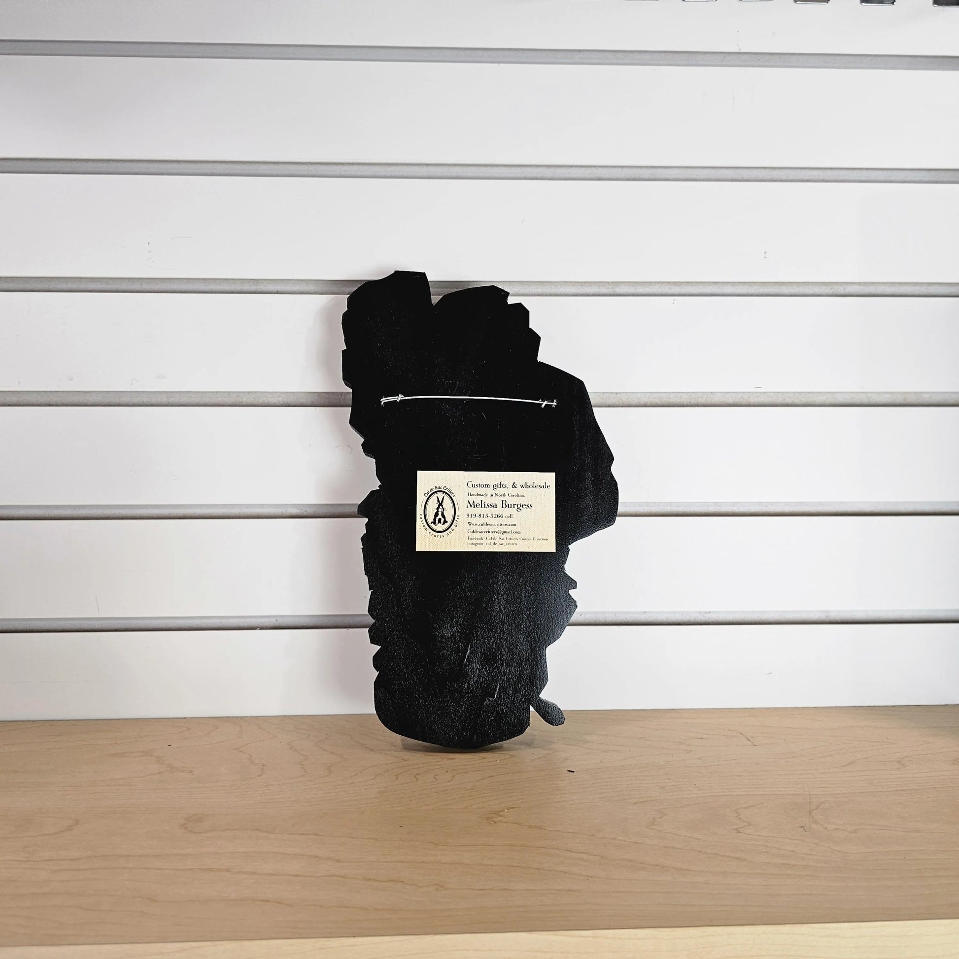 Back view of Lake Tahoe wood wall art showing handcrafted construction and mounting hardware