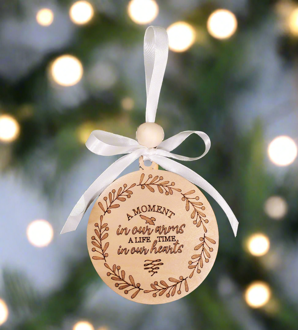 A Moment in Our Arms A Lifetime in Our Hearts - memorial ornament - engraved wood ornament with white satin ribbon