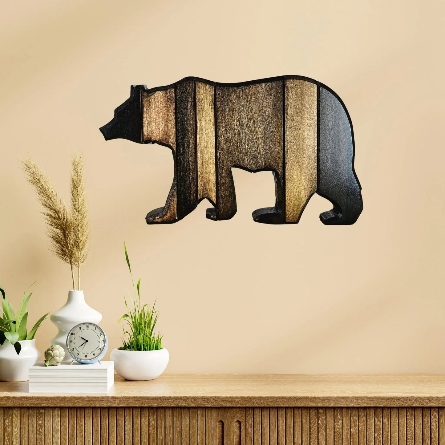 Medium size Wooden bear wall decoration on a beige wall with a wooden shelf below.