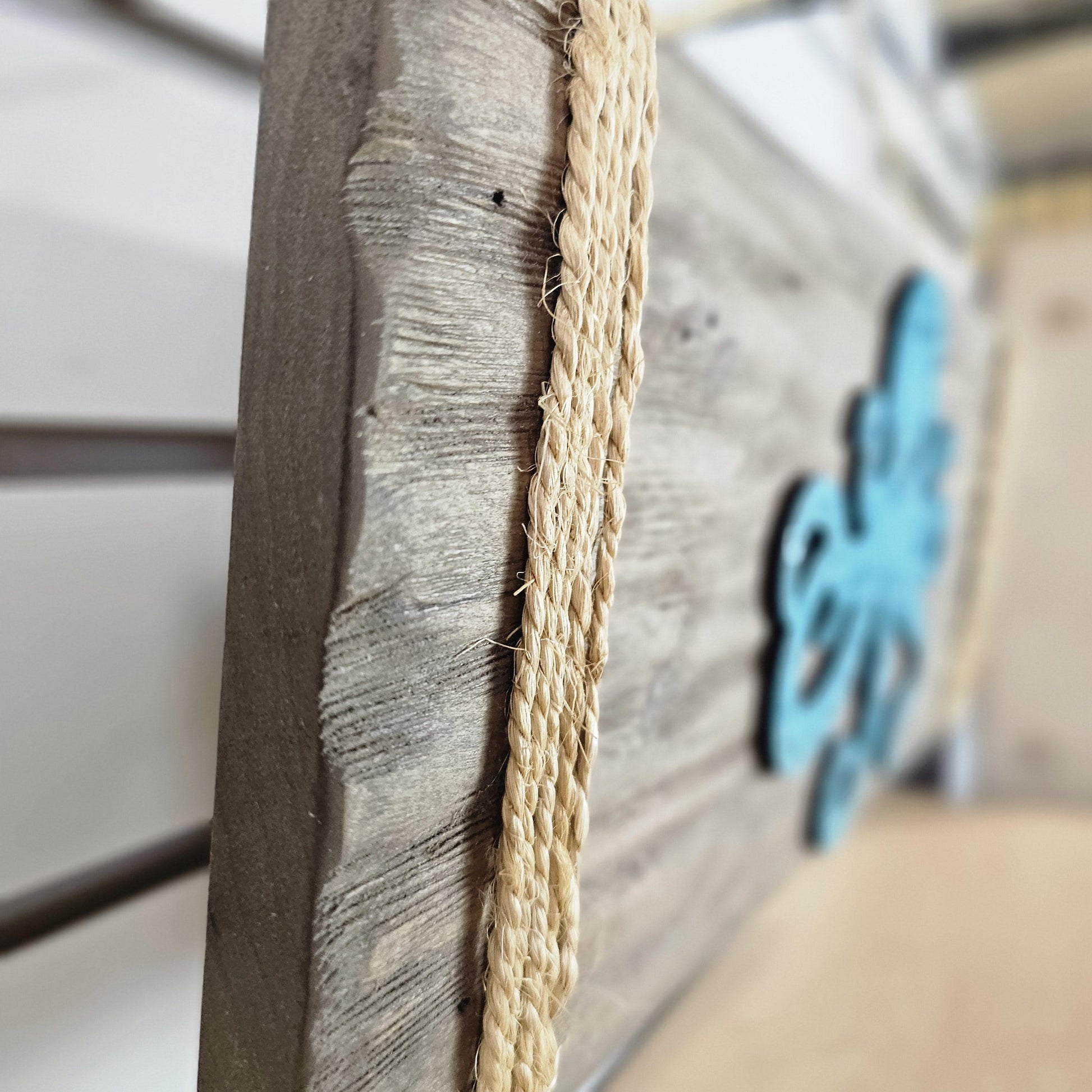 Close-up of octopus wood wall art showing handcrafted detail and tentacle design