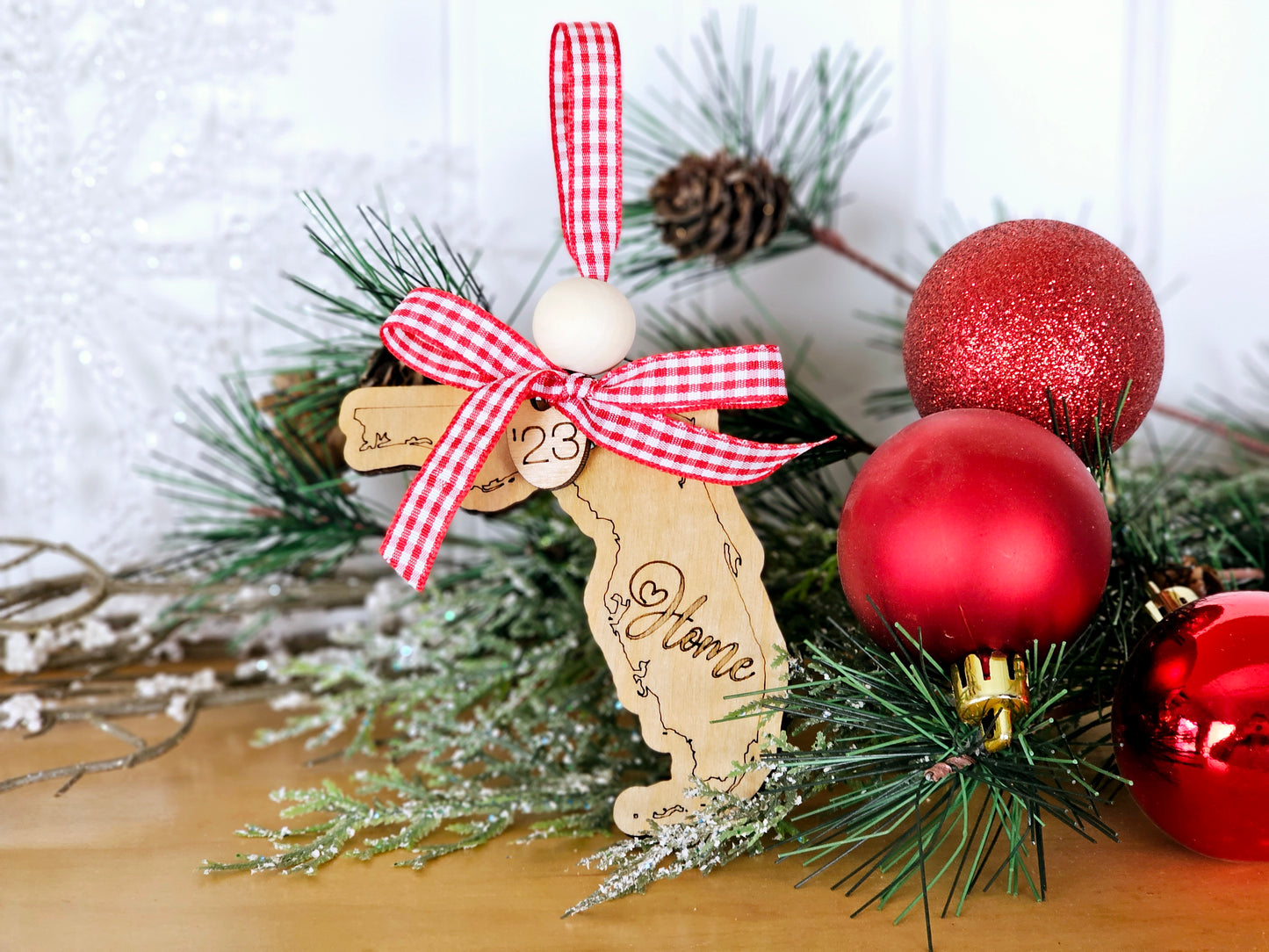 Simple & Sweet State ornaments with buffalo plaid ribbon - Home engraved on each state - a few has Take Me Home Country Roads