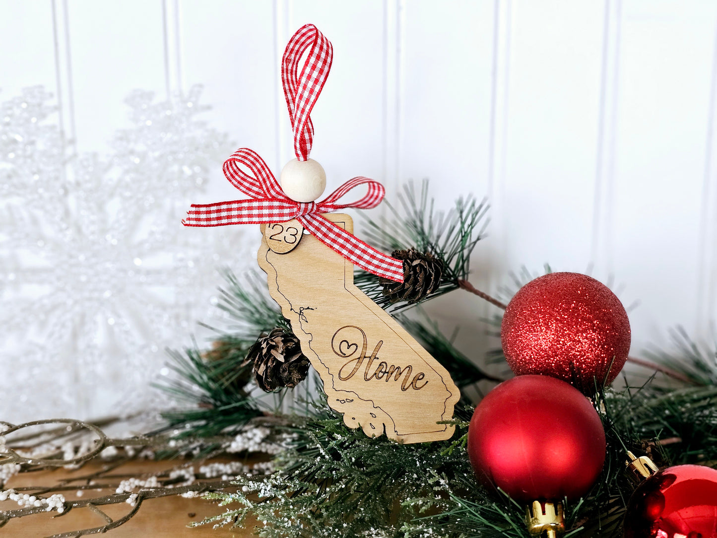 Simple & Sweet State ornaments with buffalo plaid ribbon - Home engraved on each state - a few has Take Me Home Country Roads