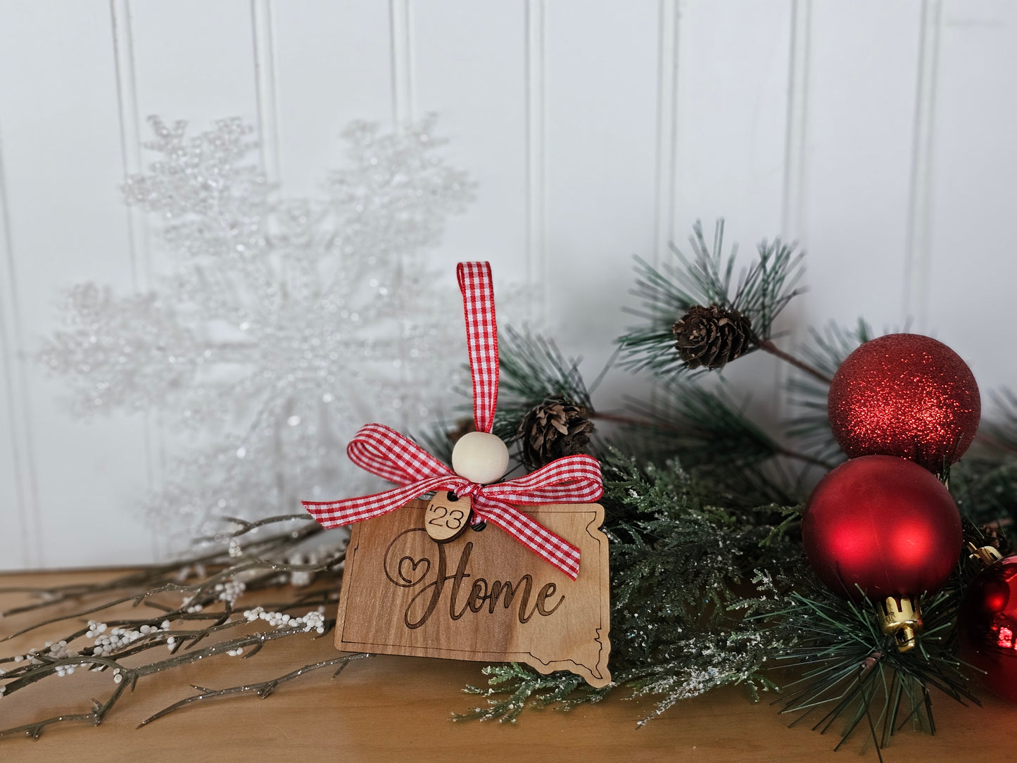 Simple & Sweet State ornaments with buffalo plaid ribbon - Home engraved on each state - a few has Take Me Home Country Roads