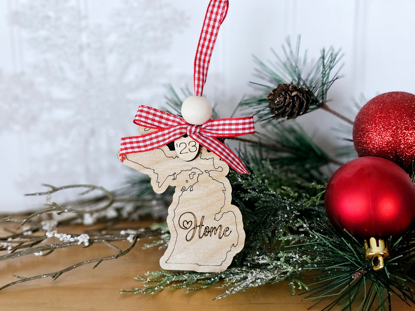 Simple & Sweet State ornaments with buffalo plaid ribbon - Home engraved on each state - a few has Take Me Home Country Roads