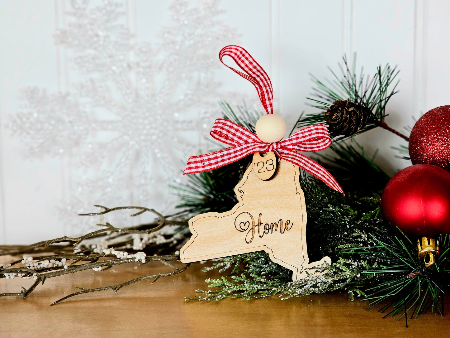 Simple & Sweet State ornaments with buffalo plaid ribbon - Home engraved on each state - a few has Take Me Home Country Roads