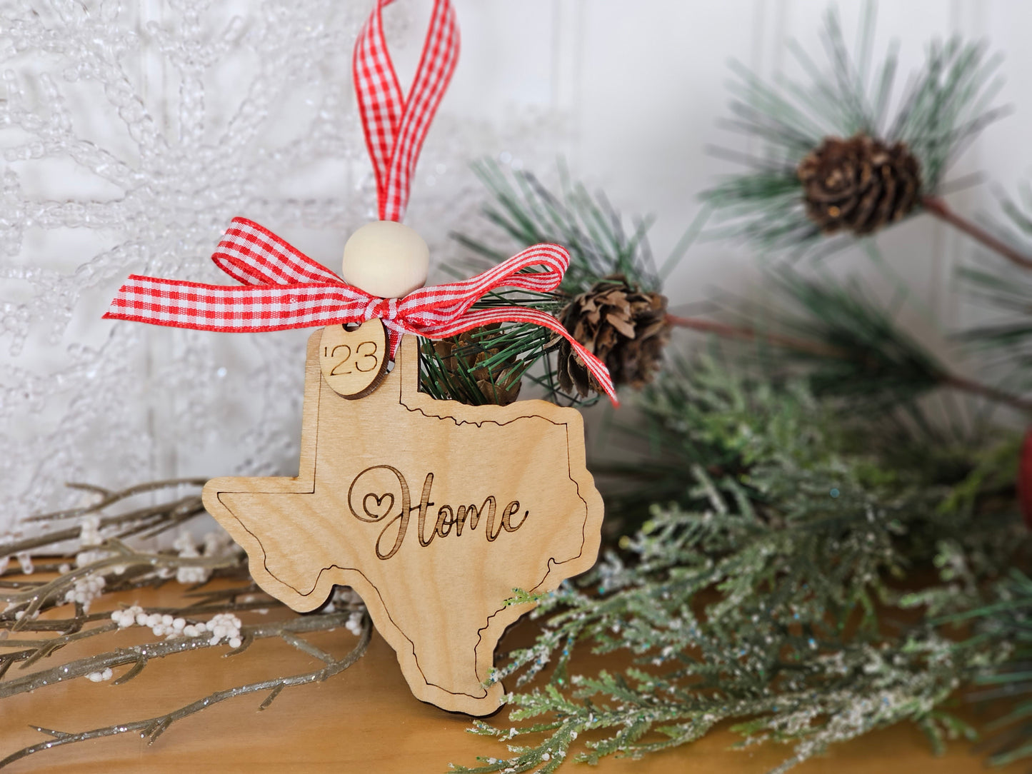 Simple & Sweet State ornaments with buffalo plaid ribbon - Home engraved on each state - a few has Take Me Home Country Roads