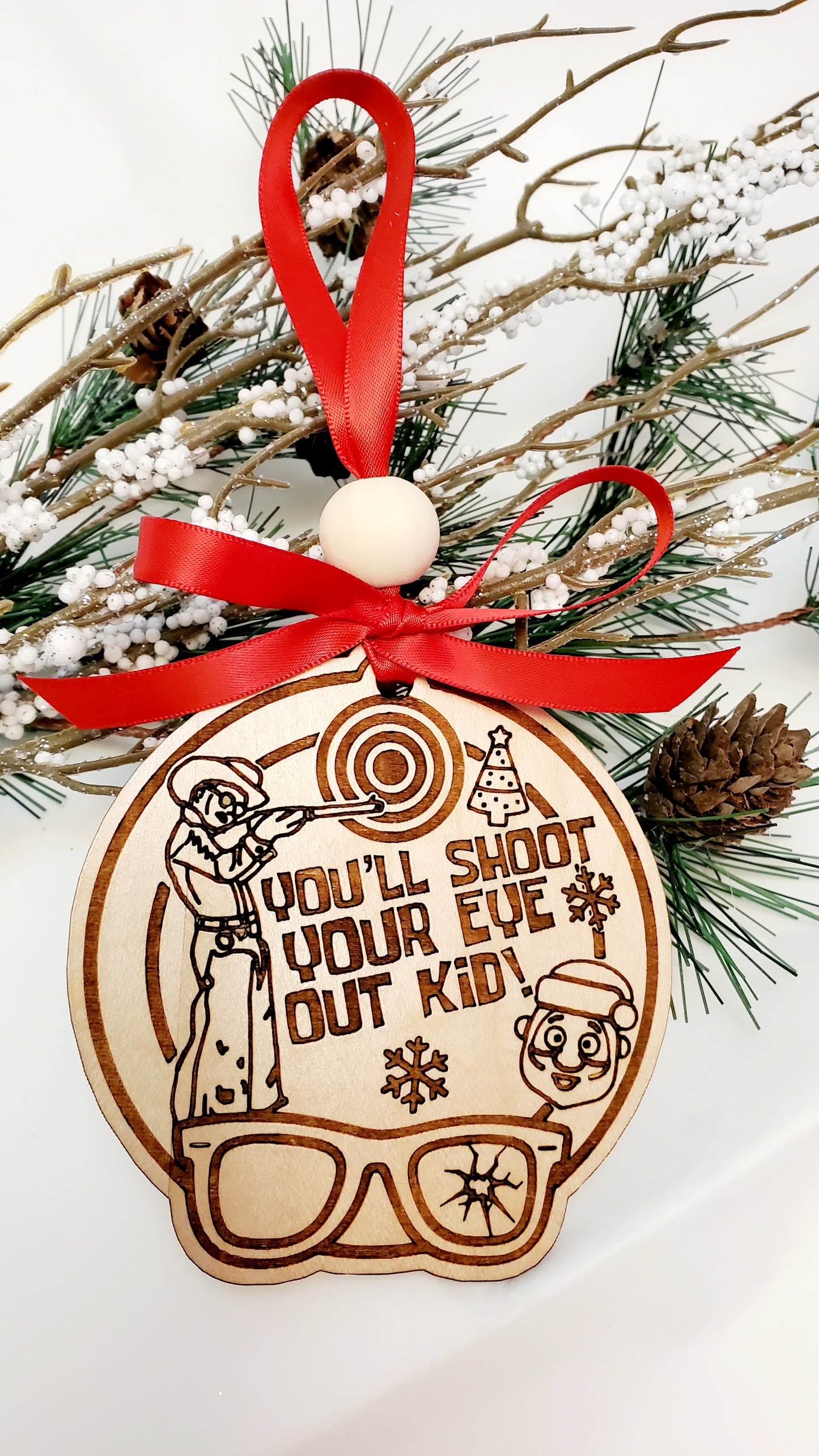 You'll Shoot Your Eye Out ornament - scene engraved on wood