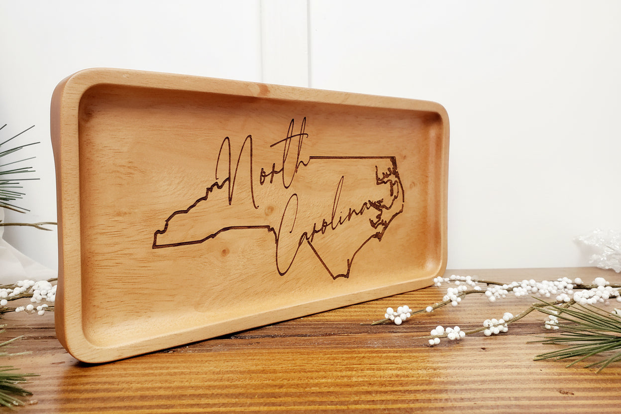 NC state shape wood tray showing side view of natural wood grain, perfect Tar Heel gift, made in USA

