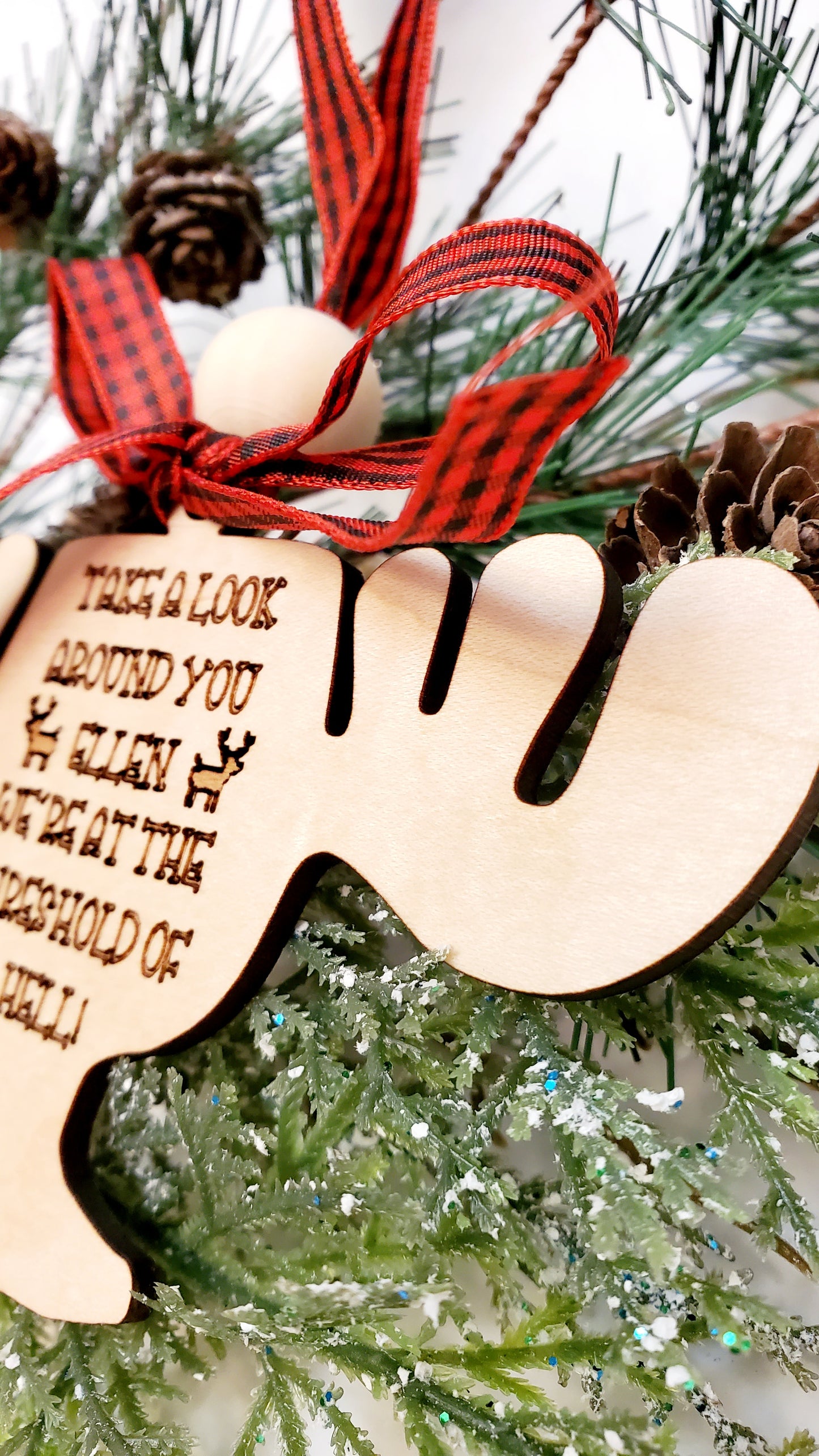 close-up of the natural grain and engraving on the moose cup ornament.