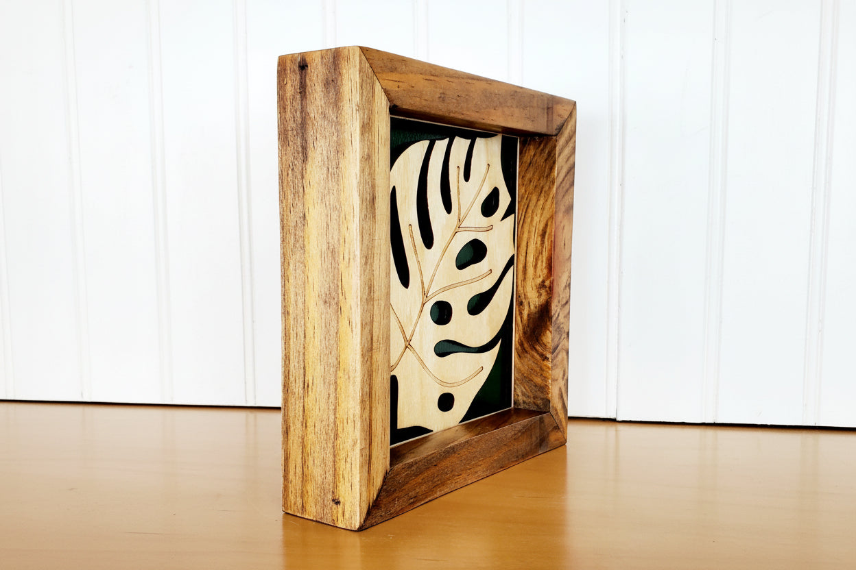 side view of framed leaf wood handmade sign